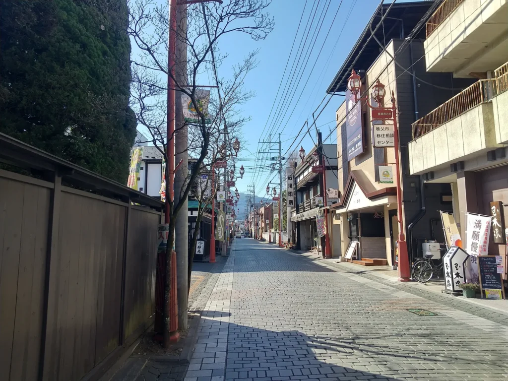 Banba-dori in central Chichibu, a paved street of old shopfronts and street lamps