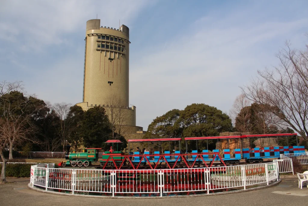 The observation tower at Nonhoi Park with the small park train running on its circular track below